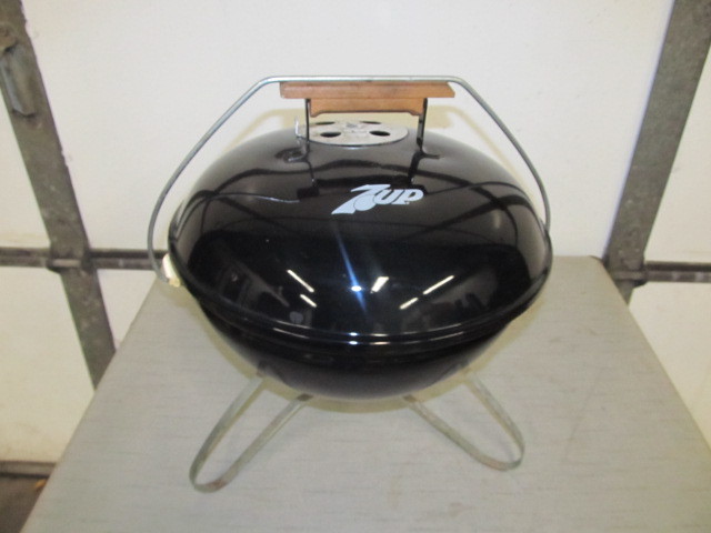 lot 155 image: 7UP Portable Charcoal Grill by Weber