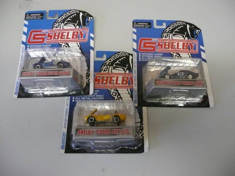 lot 8 image: 3 Shelby Collectibles - Shelby 164 - 1965 COBRA DAYTONA COUPE, COBRA SUPER SNAKE & COBRA 427 SC - NEW IN BOX - SEE PICTURES - VERY COOL