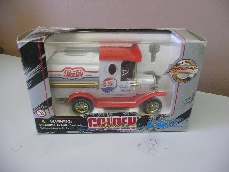 lot 13 image: Pepsi Cola Golden Classic Die-Cast Special Edition Coin Gift Bank - Never Opened See Pictures