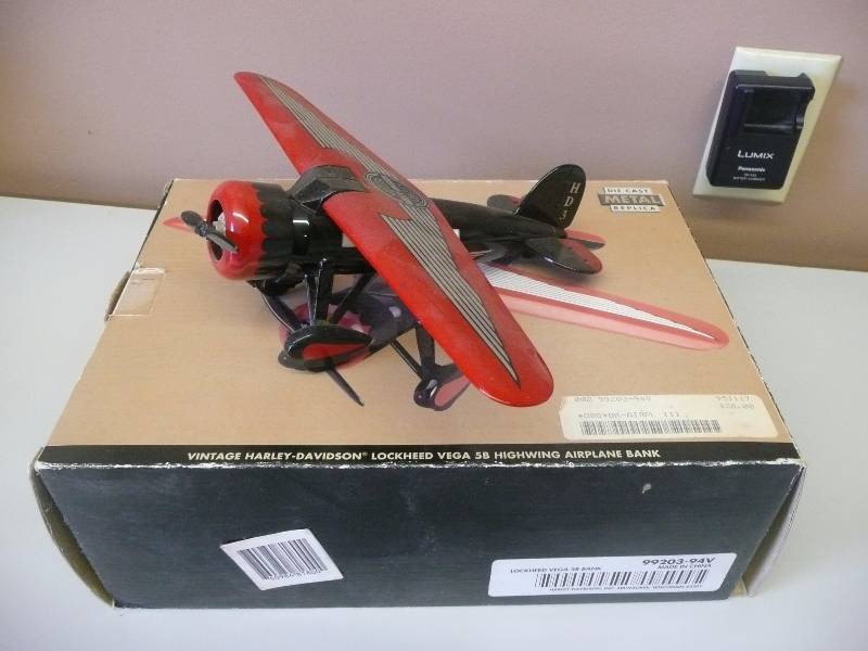 lot 23 image: HARLEY-DAVIDSON DIE CAST METAL REPLICA LOCKHEED VEGA 5B HIGHWING AIRPLANE BANK WBOX - SEE PICTURES