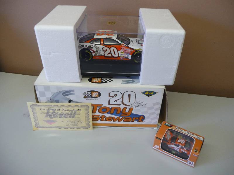 lot 47 image: Tony Stewart #20 Habitat for Humanity ROOKIE 1999 NASCAR Action 124 Diecast NEW - SEE PICTURES