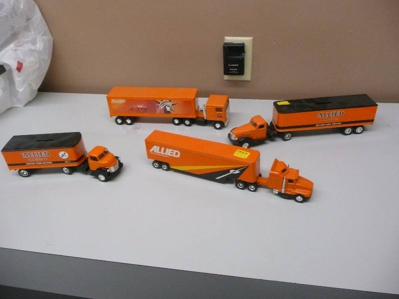 lot 6 image: ALLIED VAN LINES GENERATIONS TRACTOR TRAILER COLLECTION - GROUP OF 4 - VERY GOOD CONDITION - SEE PICTURES