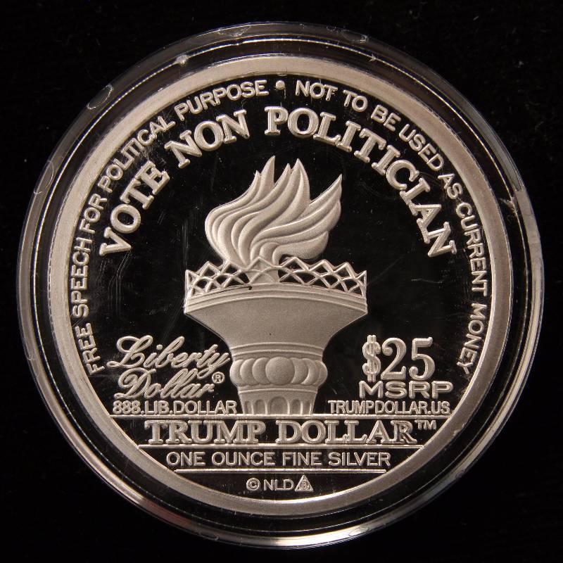 1 TROY OZ. .999 FINE SILVER TRUMP ROUND IN AIRTITE HOLDER
