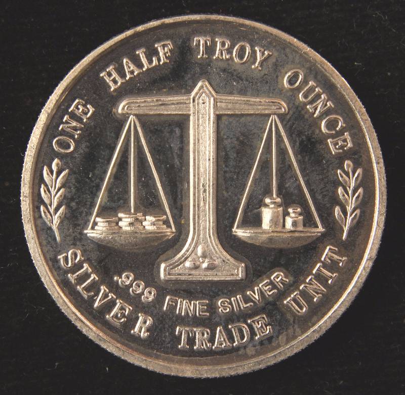 12 TROY OZ. .999 FINE SILVER ROUND JESSE HELMS