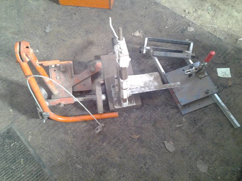 lot 5 image: Speed-Cope Jig Saw, Coping Jig, Goldblatt #11 Mini Brick Splitter, Power Tool Caddy