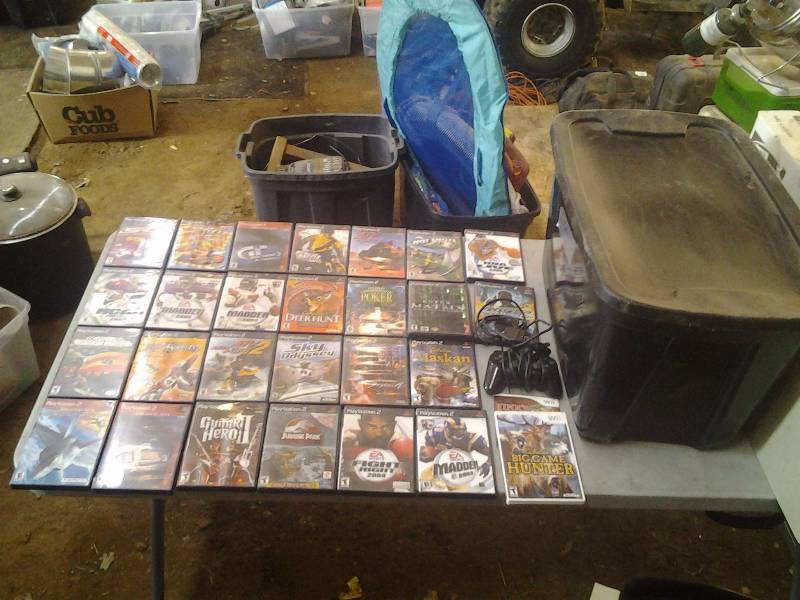 lot 31 image: Play Station 2 Games (includes tote with lid)