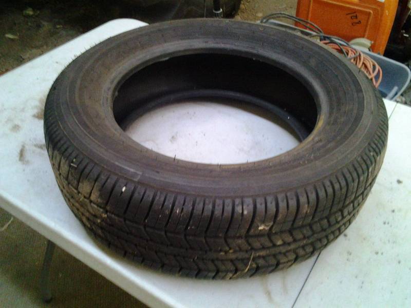 lot 55 image: 1- P19560 R-15 Tire