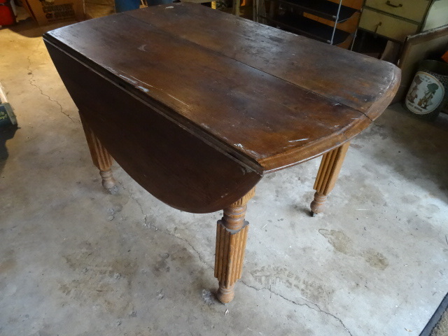 lot 82 image: Wood Oval Folding Sides Table On Wheels