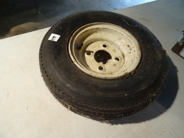 lot 119 image: Carlisle Tire 4.80-8- 4 Hole Rim, Tire New