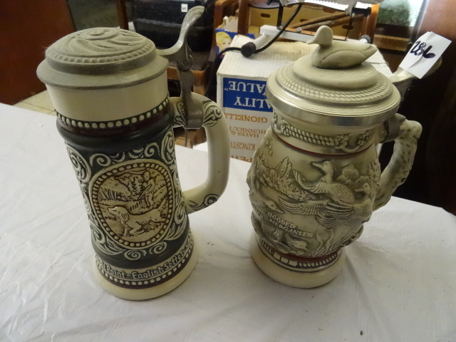 lot 286 image: 2 Avon Beer Steins Hunting Themes