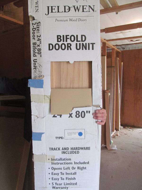 lot 29 image: Bi-fold wood door