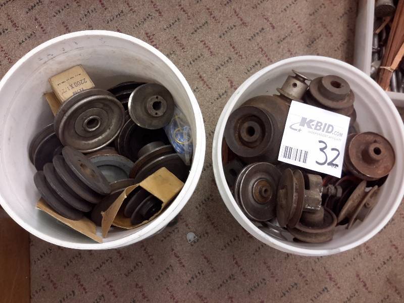lot 32 image: 2 Pails of misc. pulleys