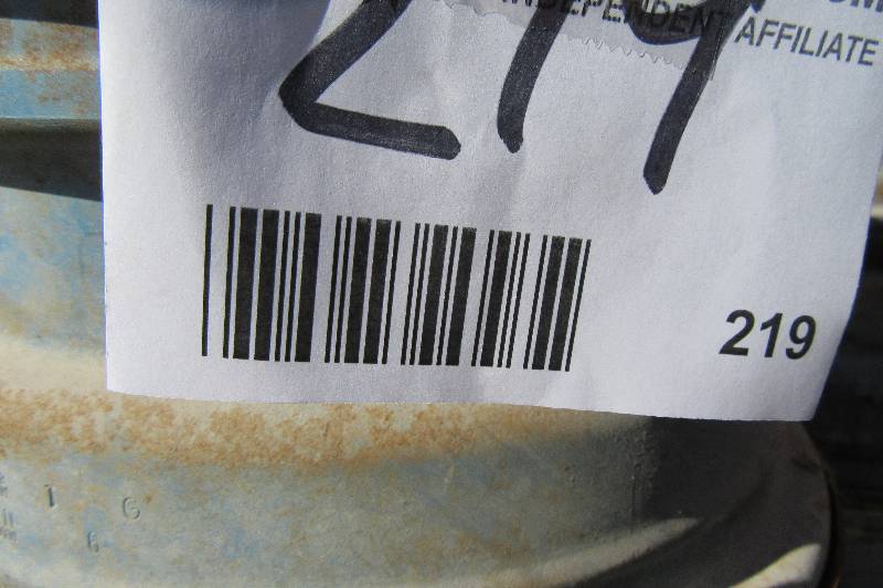 lot 219 image: 6 15 & 3 15 Pontiac steel rims & air cleaner cover
