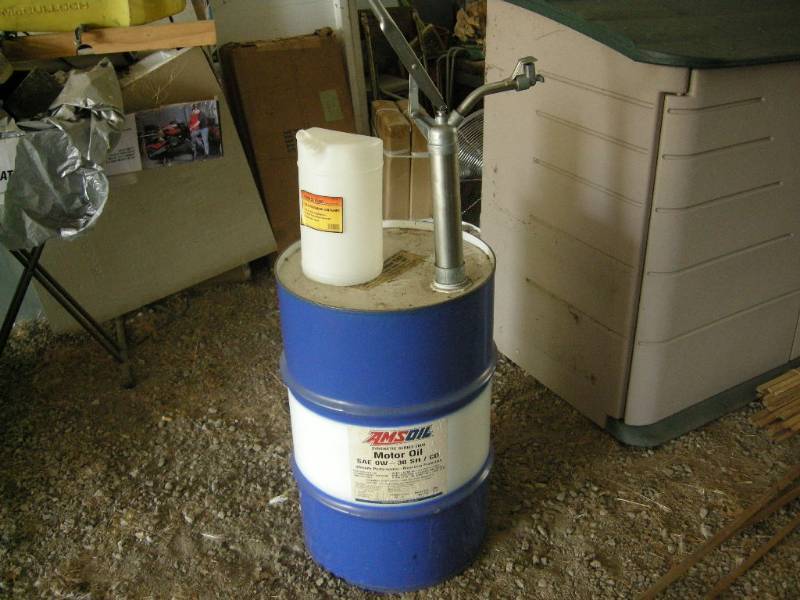 lot 238 image: Oil Barrel and Pump
