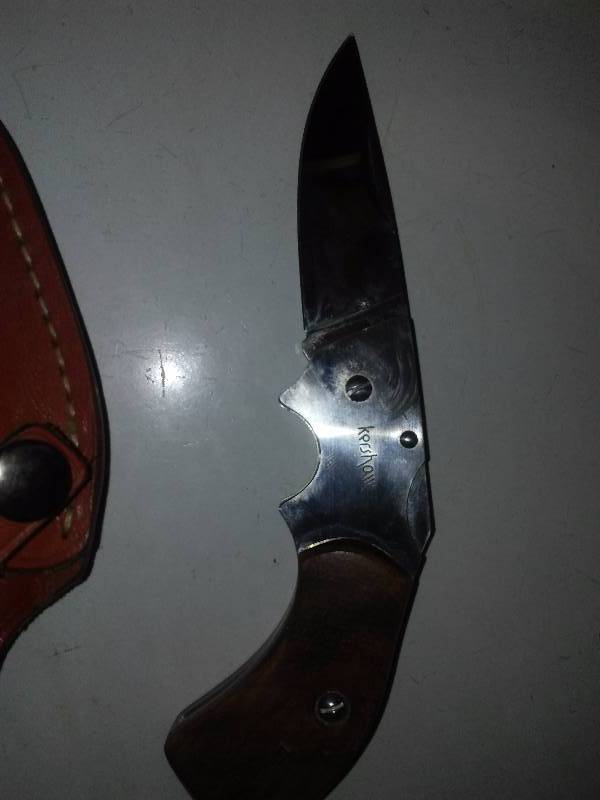 lot 14 image: Folding Knife with wood handle and leather belt sheath