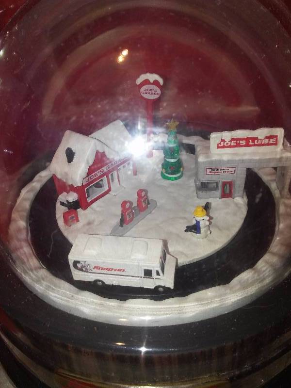 lot 28 image: Snap-on Sound and Motion Winter Village, Great Christmas Gift, plays Christmas songs and moves