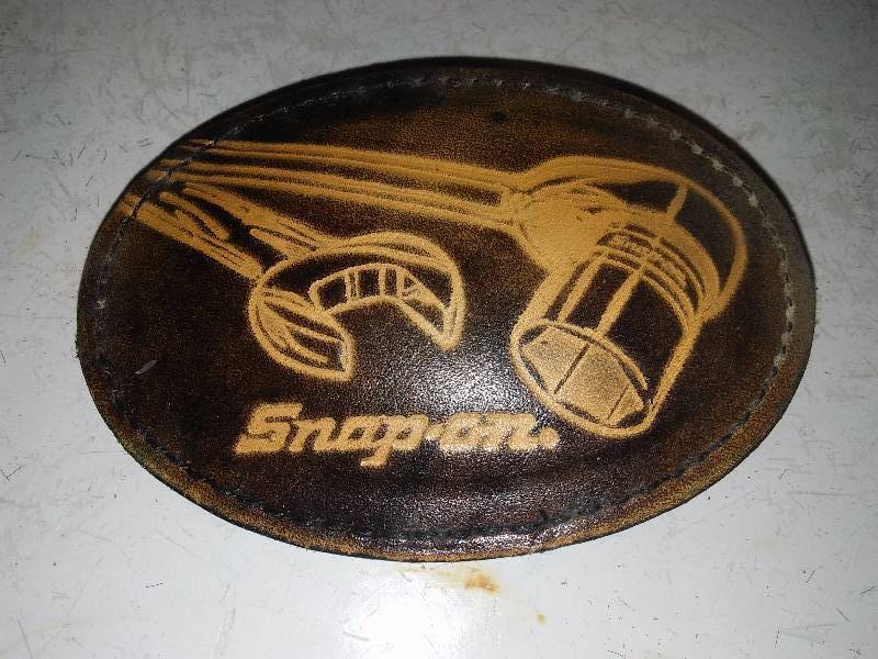 lot 48 image: Leather Snap-on Belt Buckle