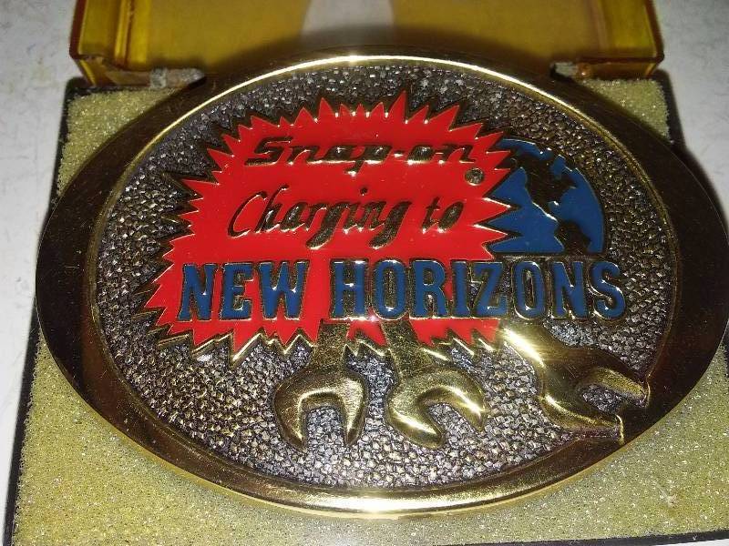 lot 49 image: Snap-on Belt Buckle (GoldRedBlue)