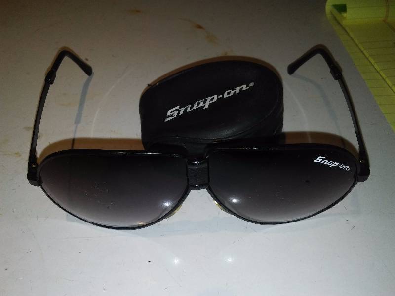 lot 60 image: Snap-on foldable sunglasses and case