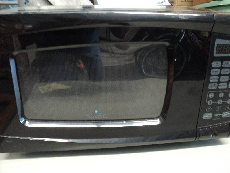 lot 313 image: black small microwave...