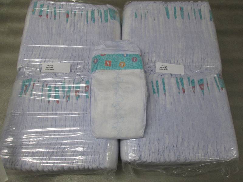 lot 203 image: 2 Packs of 50 each Disposable Diape...
