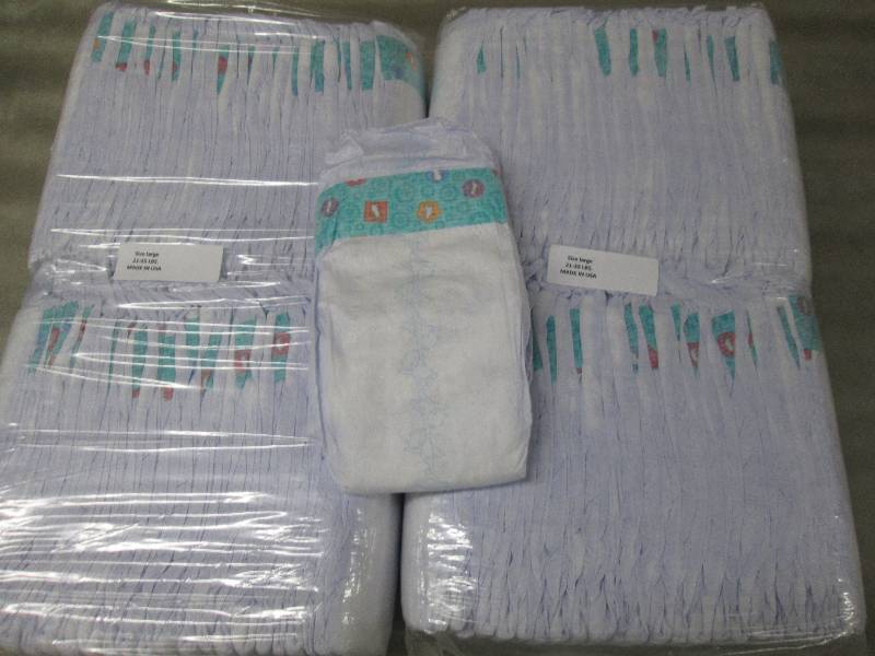 lot 207 image: 2 Packs of 50 each Disposable Diape...