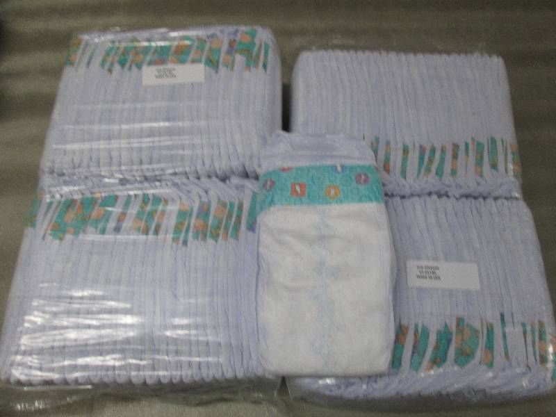 lot 213 image: 2 Packs of 50 each Disposable Diape...