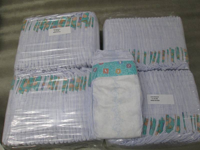 lot 215 image: 2 Packs of 50 each Disposable Diape...