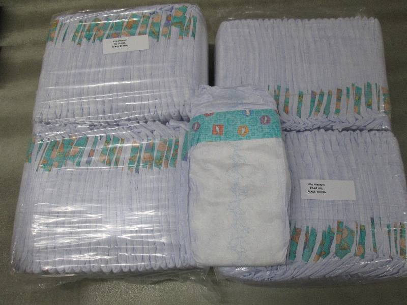 lot 217 image: 2 Packs of 50 each Disposable Diape...