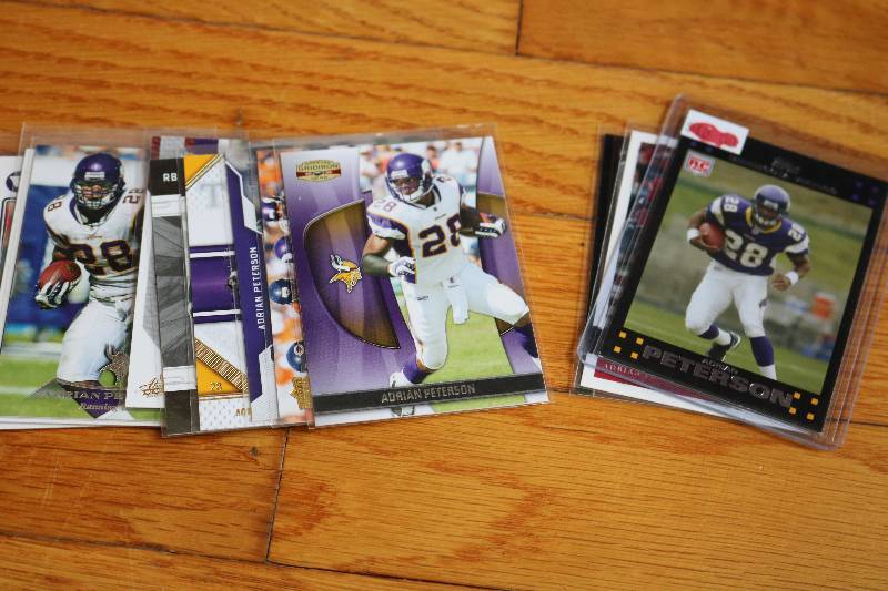 lot 2 image: 12 Adrian Peterson cards...