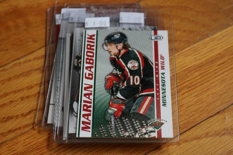 lot 87 image: Marain Gaborik cards...