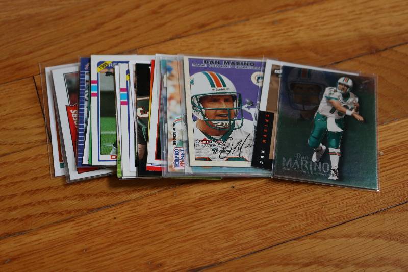 lot 92 image: 30 Dan Marino cards...