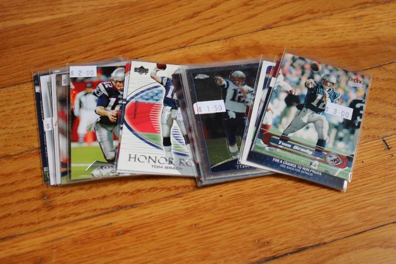 lot 72 image: Tom Brady cards...