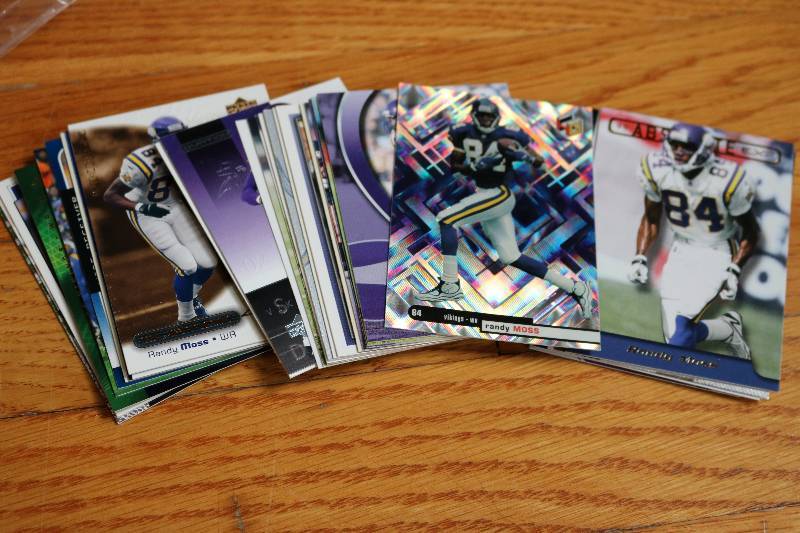lot 74 image: 30 Randy Moss cards...