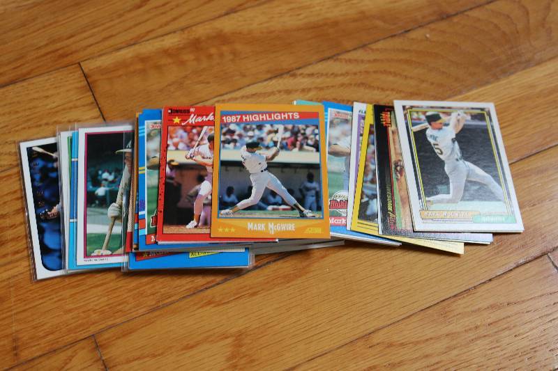lot 51 image: 50 Mark McGwire cards...