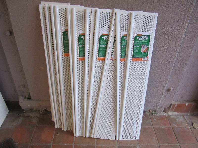 lot 238 image: Lot of 21 Snap-In Vinyl Gutter Scre...