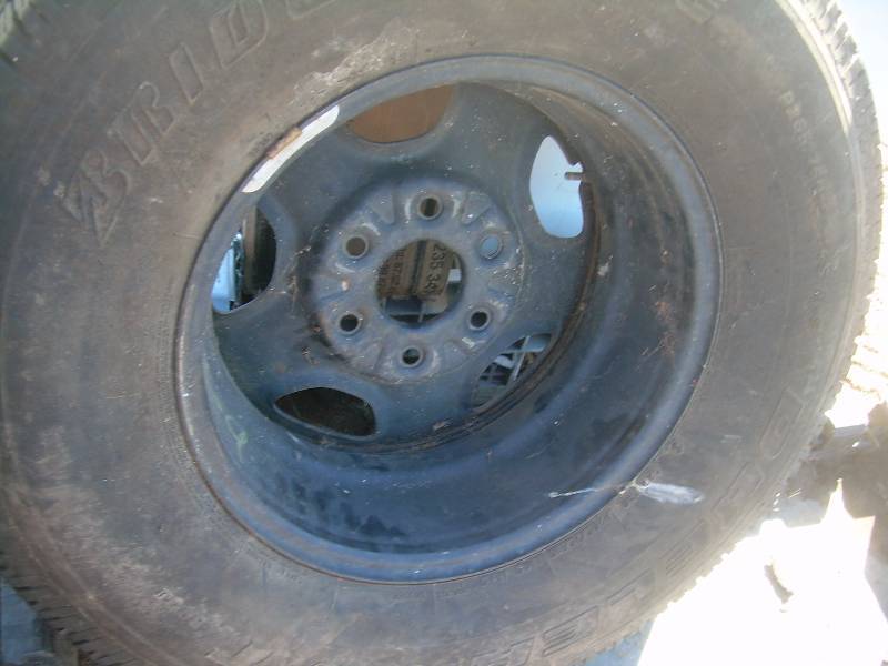 26575 R 16 5 HOLE RIM FIRE STONE TIRE