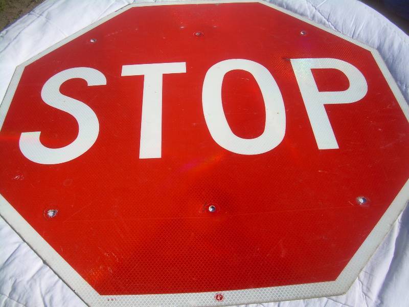 METAL BACK STOP SIGN