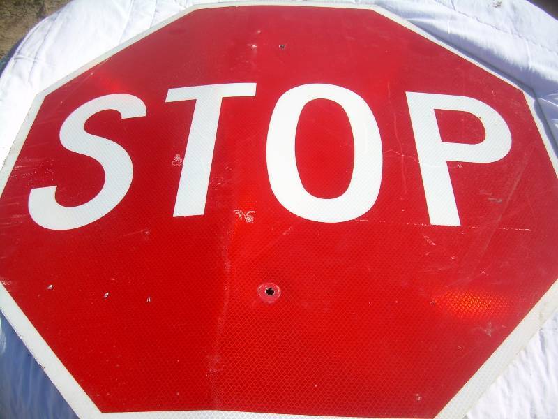 METAL BACK STOP SIGN