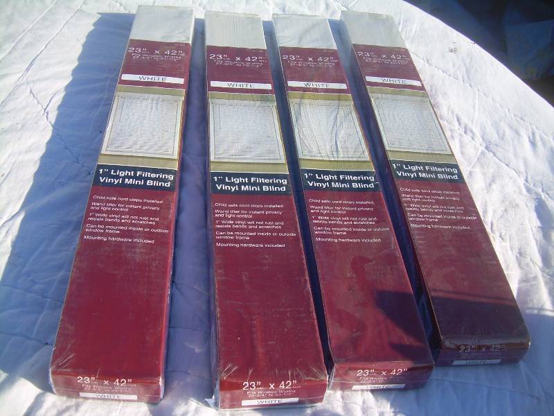 4 SETS OF WHITE BLINDS