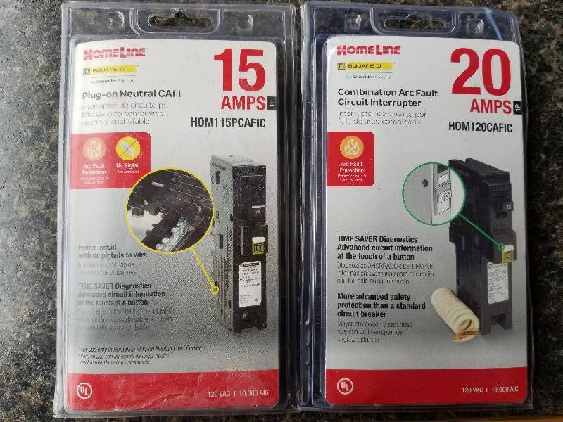 lot 73 image: Electrical - Lot - 1 Homeline 15Amp Plug-in Neutral CAFI Breaker & 1 20Amp Combination Arc Fault Breaker