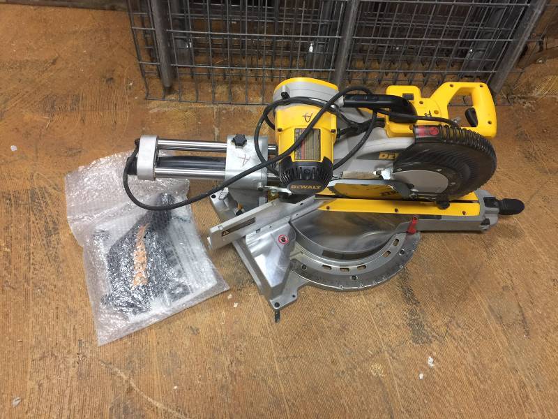 lot 1 image: Dewalt DWS780 Double Bevel Sliding Compound SAw used in like new condition