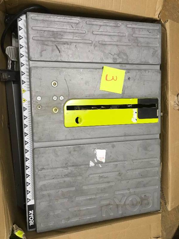 lot 3 image: Ryobi 10 in Saw with Steel Stand used in good working condition