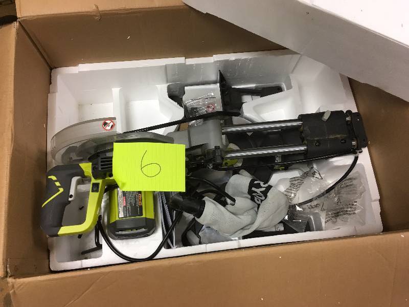 lot 6 image: Ryobi 10 in sliding compound miter saw with laser in like new condition