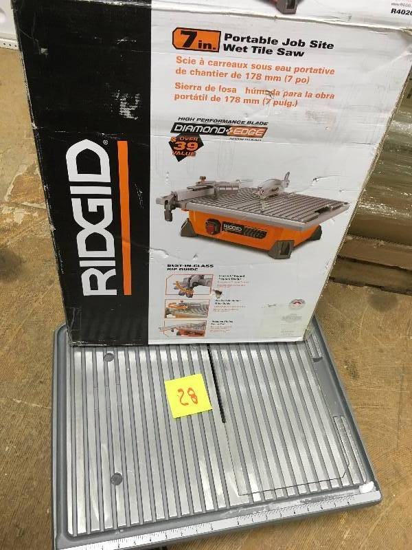 lot 28 image: Ridgid 7 in Portable Job Site Wet Tile Saw used in working condition