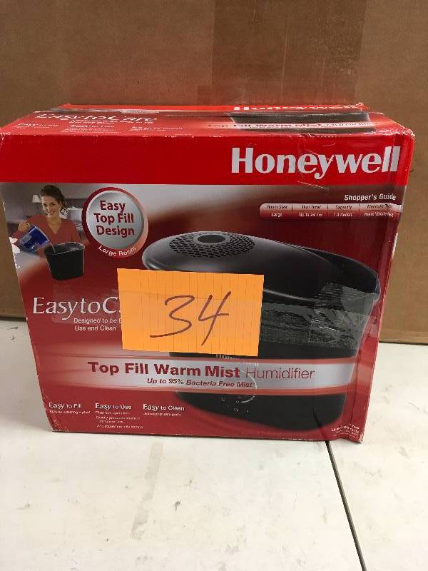 lot 34 image: Honeywell Easy-To-Care Warm Mist Humidifier - Black never used in box