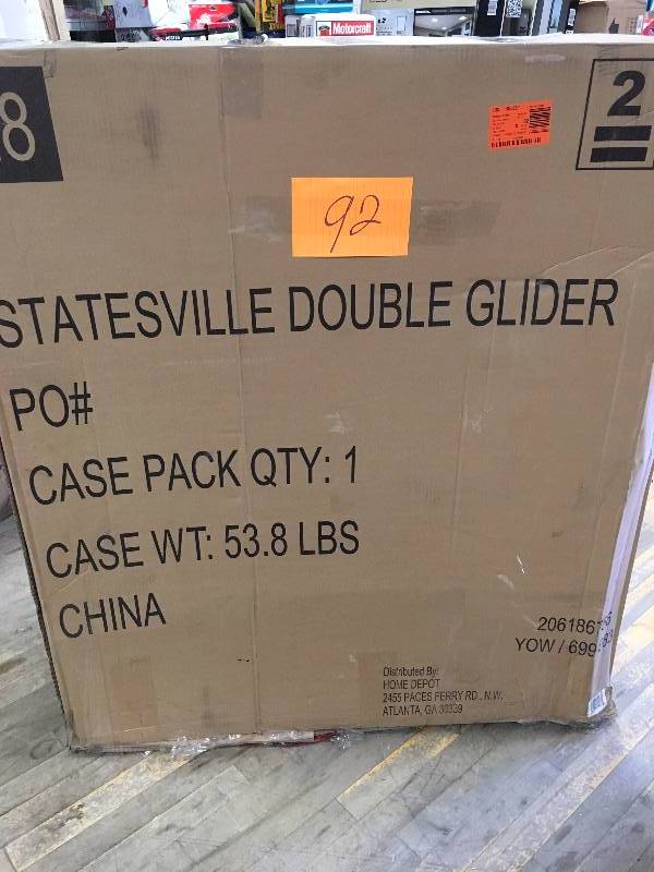 lot 92 image: Hampton Bay Statesville Patio Double Glider never used in box MSRP $270