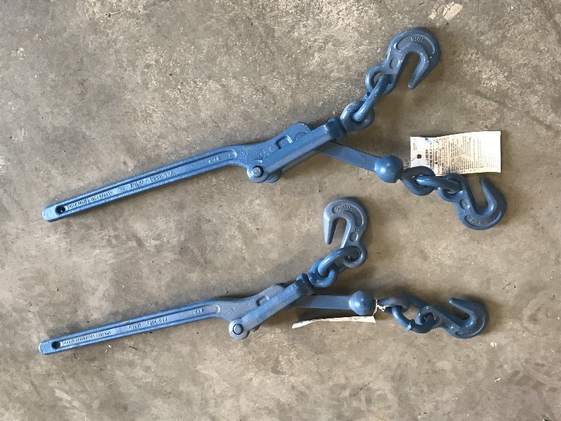 lot 122 image: (2) 38 Chain Binders
