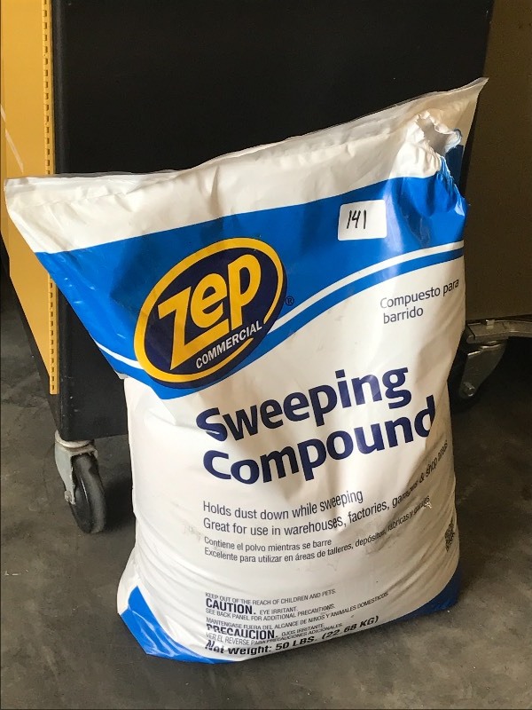 lot 141 image: Bag Of Floor Sweeping Compound