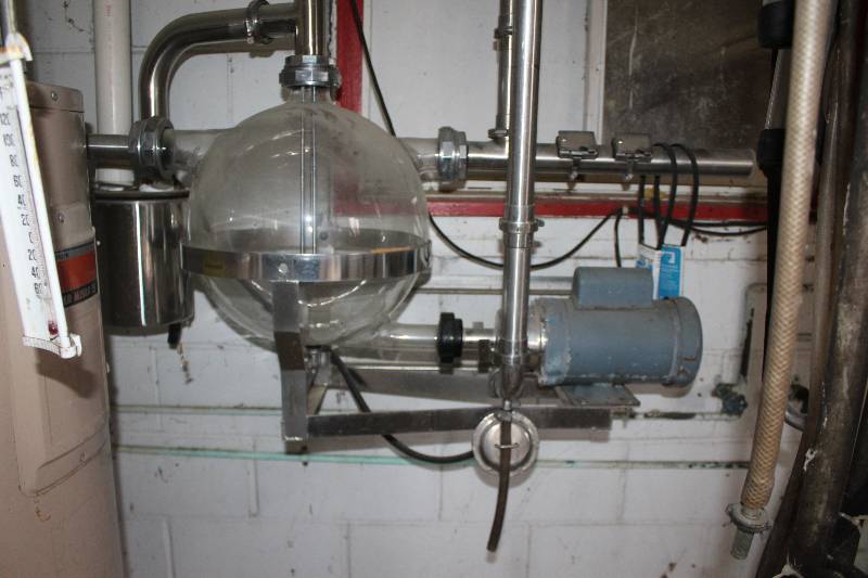 lot 33 image: Ben H. Anderson Mfgrs. Dairy Equipment